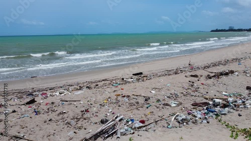 Garbage piled up on the beach represents a serious environmental and natural issue, emphasizing pollution's impact on ecosystems and the urgent need for coastal conservation and cleanup.