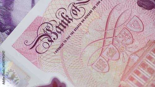 Macro close up of Pound Sterling bank notes.