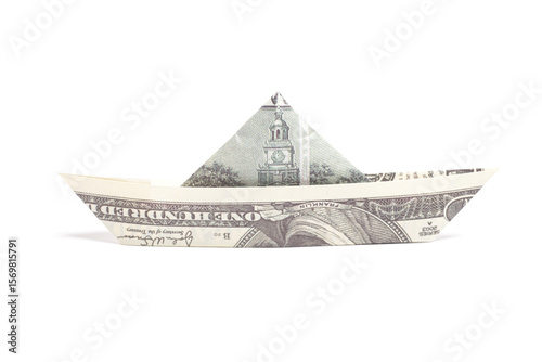 Money Origami boat with one hundred Dollar bills