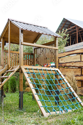 Tablou pe pânză Child wooden handmade playset outdoors