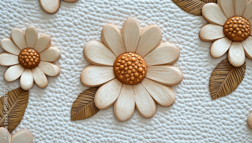 Close-up of texture with wood and floral design on white leather, with small wooden daisies on light brown and green leaves