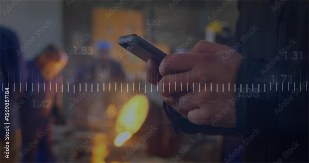 Engineer tapping smartphone screen in foundry, monitoring pulsing waveform and numeric values