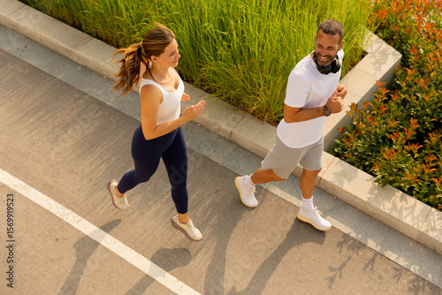 Joyful morning joggers enjo...