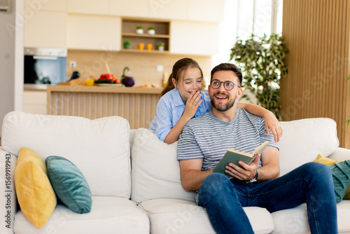 Father and daughter share a...