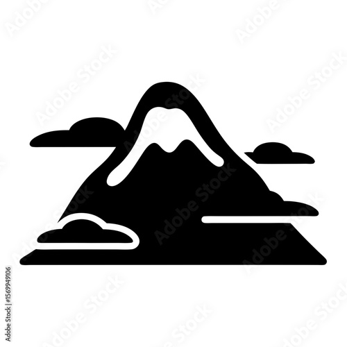 Monochromatic image of a majestic mountain peak surrounded by fluffy clouds