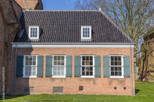 Widows with shutters on the Maartens church in Tiel, Netherlands