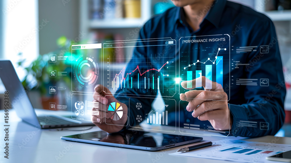 Fototapeta premium A sleek digital business analytics dashboard overlays a contemporary workspace, showcasing interactive charts, graphs, and metrics