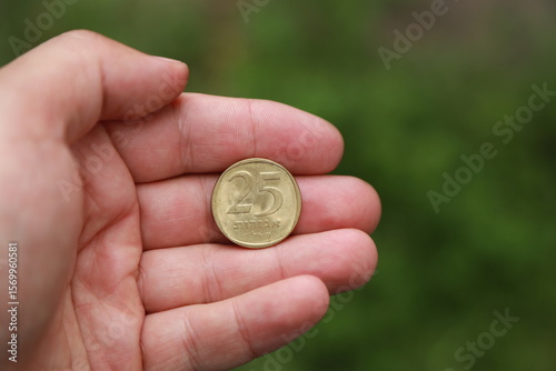 Israeli change coin on wooden table