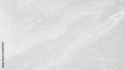White wall with a white background. The wall is made of concrete. There are no other colors visible.