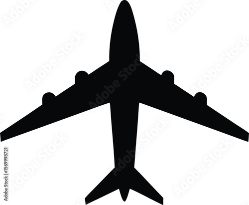 Silhouette of a jet airplane seen from above in flight