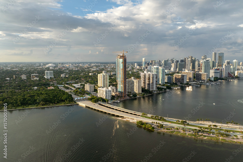 Fototapeta premium View from above of waterfront buildings in downtown district of Miami, Florida, USA. American city with business financial district