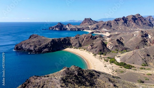 Aerial View of Serene Beach Surrounded by Rocky Hills and Blue Waters