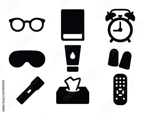 Nightstand Essentials Icons. Solid, filled icons set of nightstand drawer contents: reading glasses, paperback