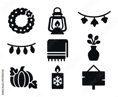 Seasonal Decor Icons. Solid, filled icons set of seasonal home décor: spring wreath, summer lantern, fall