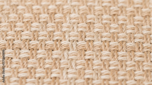 Detailed textured jute fabric in beige tones with a woven pattern creating a natural and sustainable backdrop