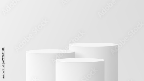 Three white cylindrical podiums for product display, a modern clean mockup for presentation and advertising.