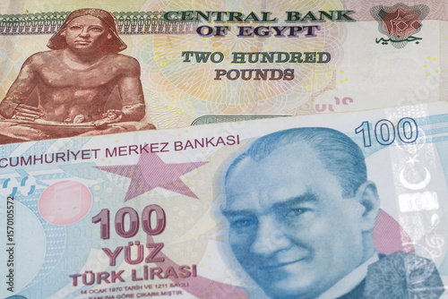 Fototapeta Naklejka Na Ścianę i Meble -  200 Egyptian pound and 100 Turkish lira banknotes. International trade concept