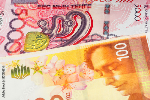 Wallpaper Mural 5000 Kazakhstani tenge and 100 Israeli shekel banknotes. International trade concept Torontodigital.ca