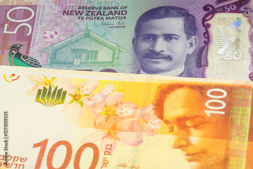 Wallpaper Mural 50 New Zealand dollar and 100 Israeli shekel banknotes. International trade concept Torontodigital.ca