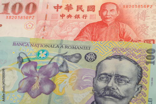 Wallpaper Mural 100 New Taiwan dollar and 100 Romanian leu banknotes. International trade concept Torontodigital.ca