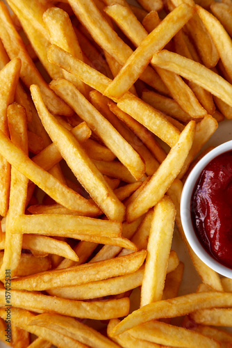 Homemade Golden French Fries with Ketchup, top view. Close-up.