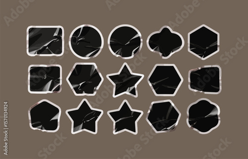 Collection of abstract geometric shapes including squares circles hexagons and stars with a crumpled textured black surface and white borders against a muted brown background