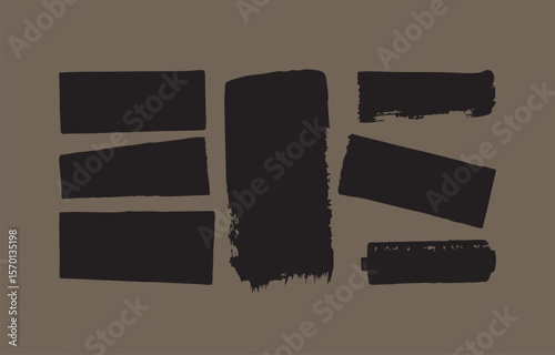 A collection of seven abstract black brush stroke shapes and rectangles arranged on a muted brown background creating a modern graphic design element