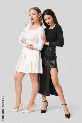 Two different young women p...