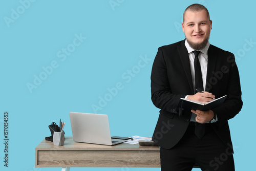 Office worker with notebook...