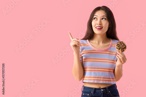 Young Asian woman with cook...