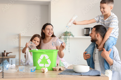 Family sorting plastic garb...