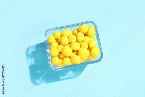 Bowl with cheese coated pea...