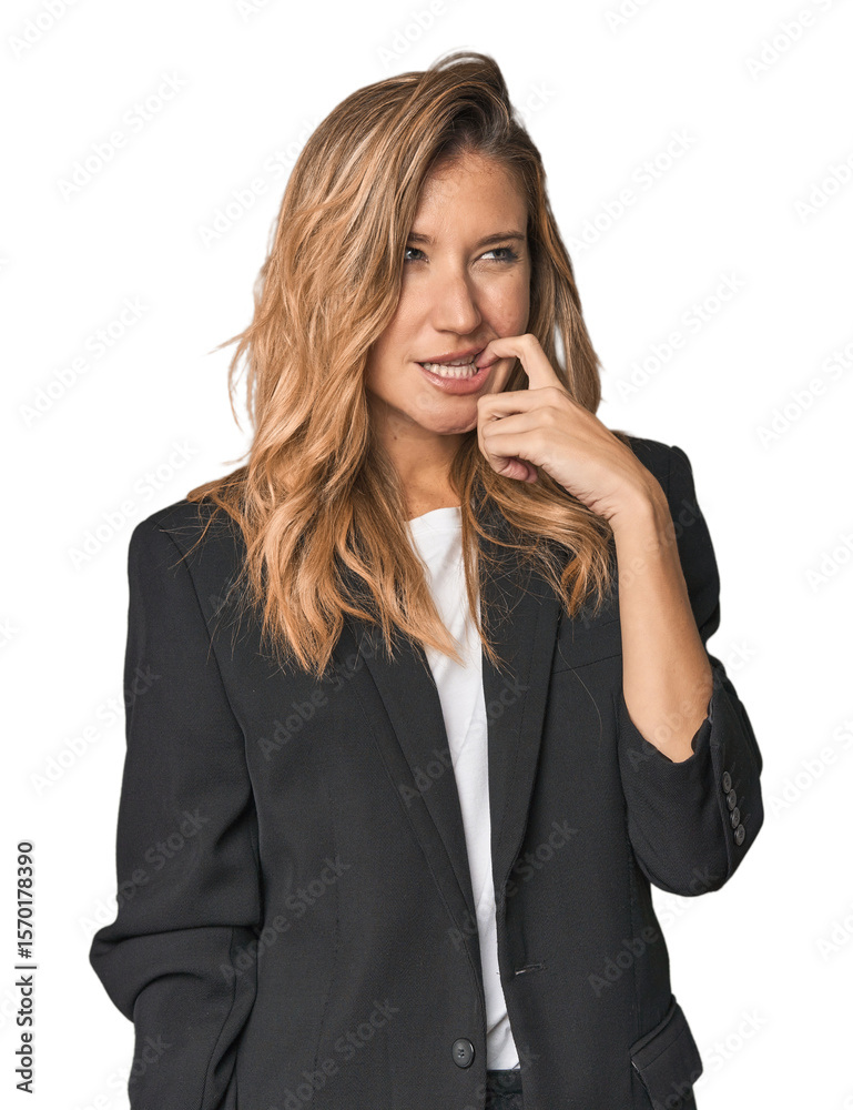 Young businesswoman in a suit relaxed thinking about something looking at a copy space. Young businesswoman in a suit relaxed thinking about something looking at a copy space.