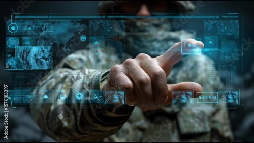Soldier’s hand operating a holographic touchscreen showing military technology icons such as satellite surveillance, cyber defense, and tactical AI maps