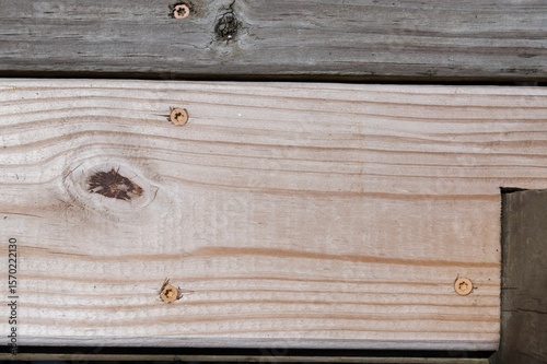 Knot in board in wood deck