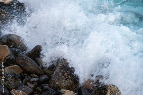 Fototapeta Naklejka Na Ścianę i Meble -  breaking waves at the pebble beach