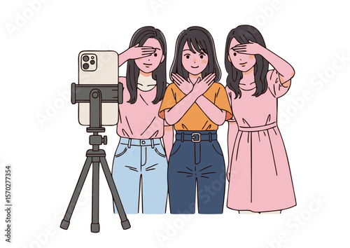 Three Young Women Posing with Smartphone and Tripod Covering Eyes.
