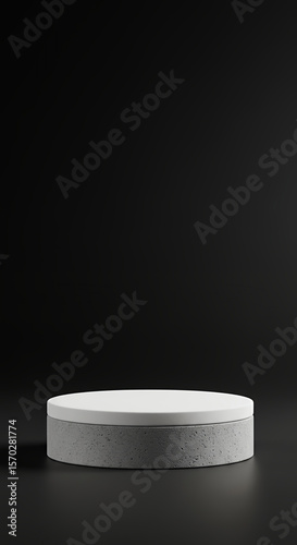 Minimalist cylinder pedestal with white top on dark background