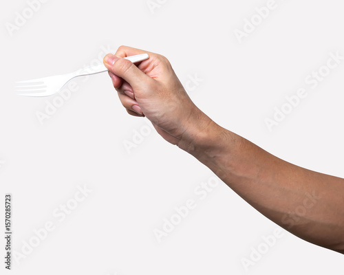 Male hand holding a white plastic fork isolated on white background.