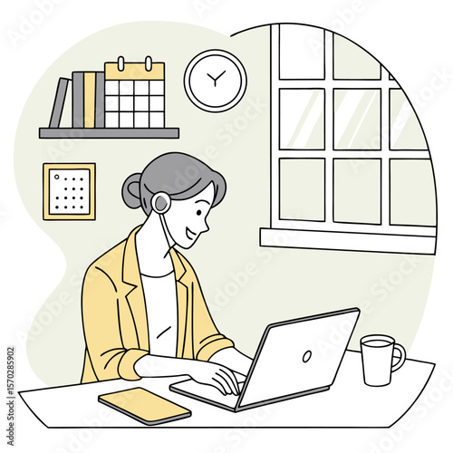 Woman with headset working on laptop at desk with calendar, books, clock, and window in background view