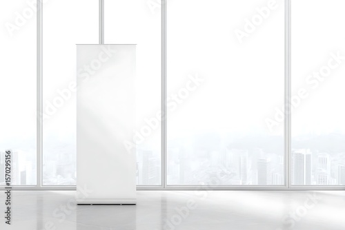 Empty roll-up banner display in a modern room.