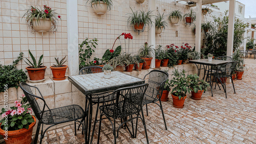 Charming outdoor seating surrounded by lush plants