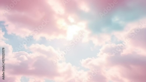 Soft pastel clouds illuminated by sunlight in the sky