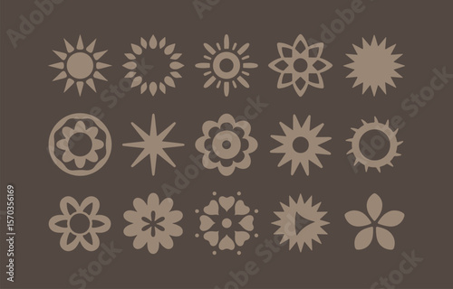 A collection of stylized floral and sunburst motifs in a muted earthy tone arranged in a grid on a dark brown background perfect for decorative patterns and graphic design elements