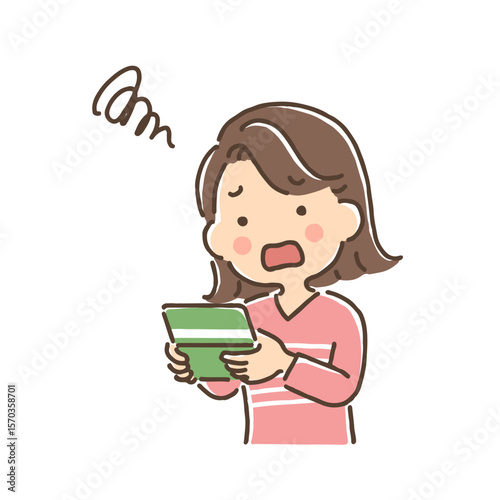 通帳を見て落ち込んでいる若い女性