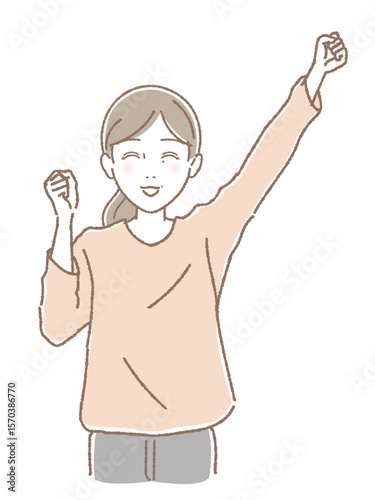 拳をあげて応援する中高年女性