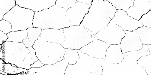 high contrast black and white image of a cracked white wall with cracks and damaged texture, creating an abstract and distressed background look