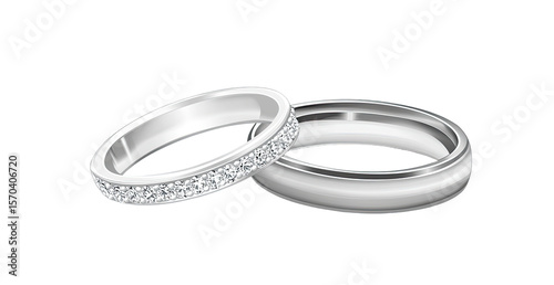 Two elegant, white metal wedding rings, one with pave diamonds