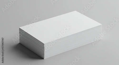 Stack of Blank White Paper on a Gray Background with Shadows