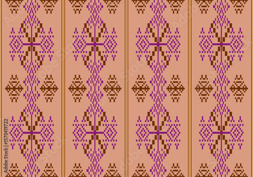 This pixel Thai fabric design features a vertical symmetrical motif in pink and brown colors on a light background. The repeating pattern resembles traditional weaving with modern digital aesthetics.